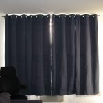 A black curtain on a window