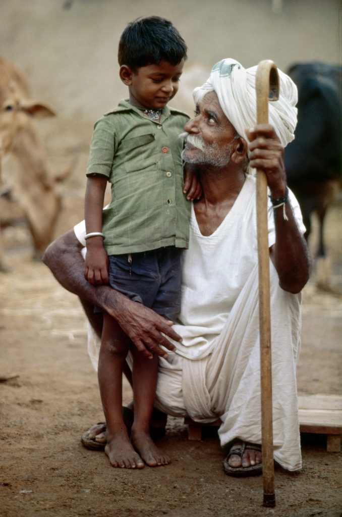 A grandfather in the Banjara tribal community showering his affection on a young boy near Hyderabad.