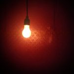 A light bulb in a dark room