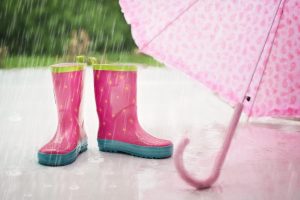 raining day, image of rainboots and umbrella pink color
