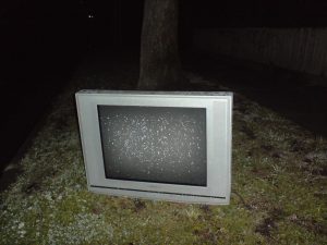 Abadoned TV in the rain