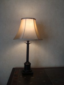 lamp in the corner of the desk