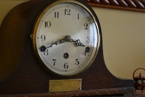 brown frame side bed clock